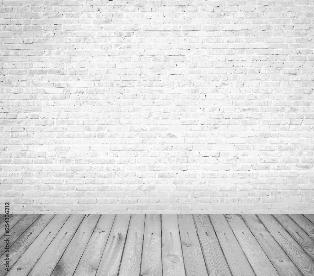Grunge white brick wall with wooden floor