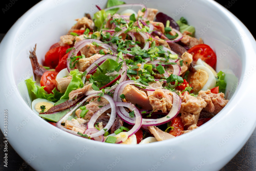 Salad with herring, greens, boiled eggs and pepper. Salad with herring, greens, boiled eggs and pepper.