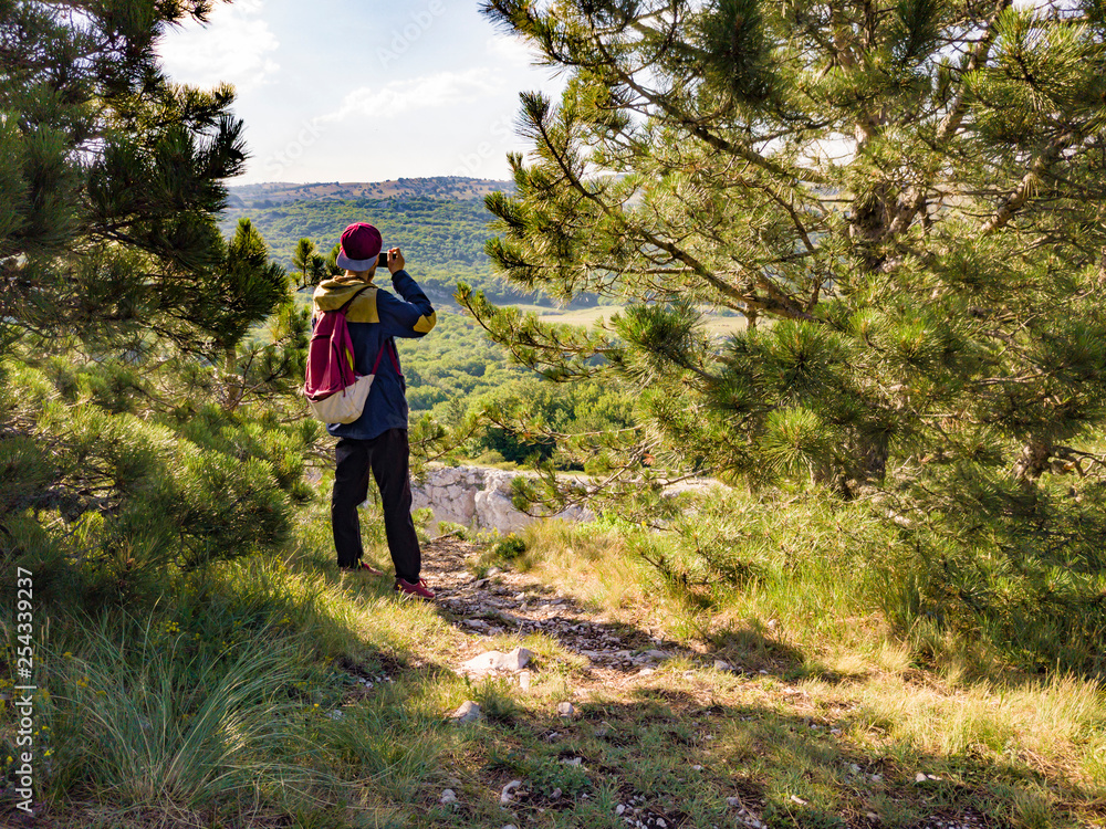 Fototapeta premium professional photographer trying to chase nature