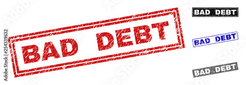 Grunge BAD DEBT rectangle stamp seals isolated on a white background. Rectangular seals with grunge texture in red, blue, black and gray colors.