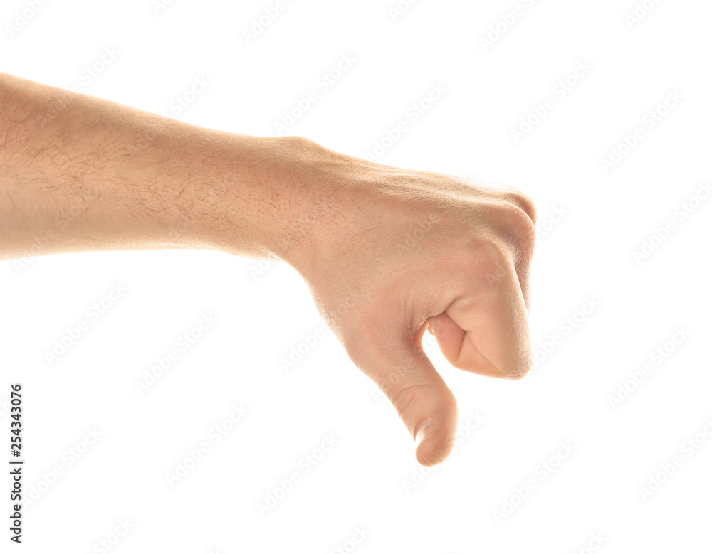 Male hand showing thumb-down on white background Male hand showing thumb-down on white background