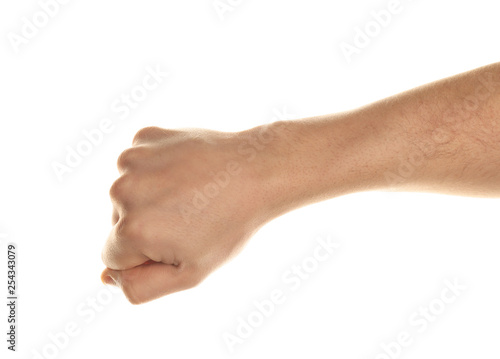 Male hand holding something on white background