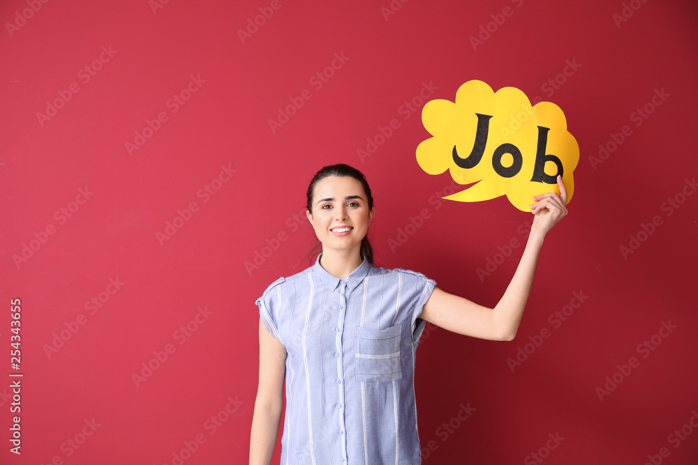 Young woman holding speech bubble with word JOB on color background Young woman holding speech bubble with word JOB on color background
