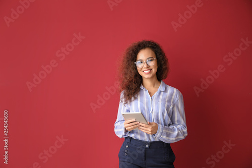 Young businesswoman with ta...