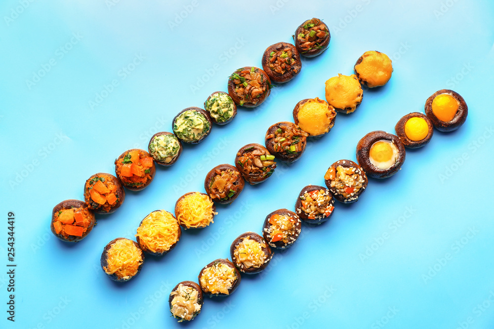 Tasty stuffed mushrooms on color background Tasty stuffed mushrooms on color background