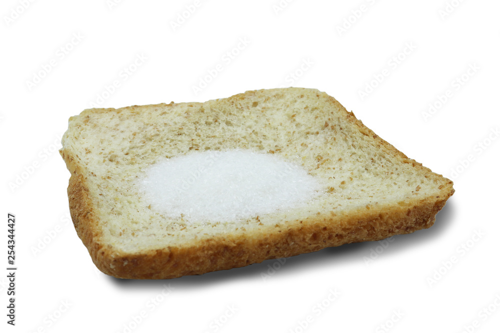 Monosodium glutamate (MSG) on slice breads isolated on white background.