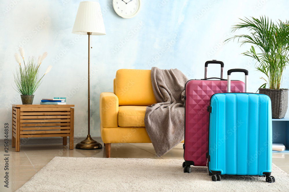 Packed suitcases in room. Travel concept - obrazy, fototapety, plakaty 