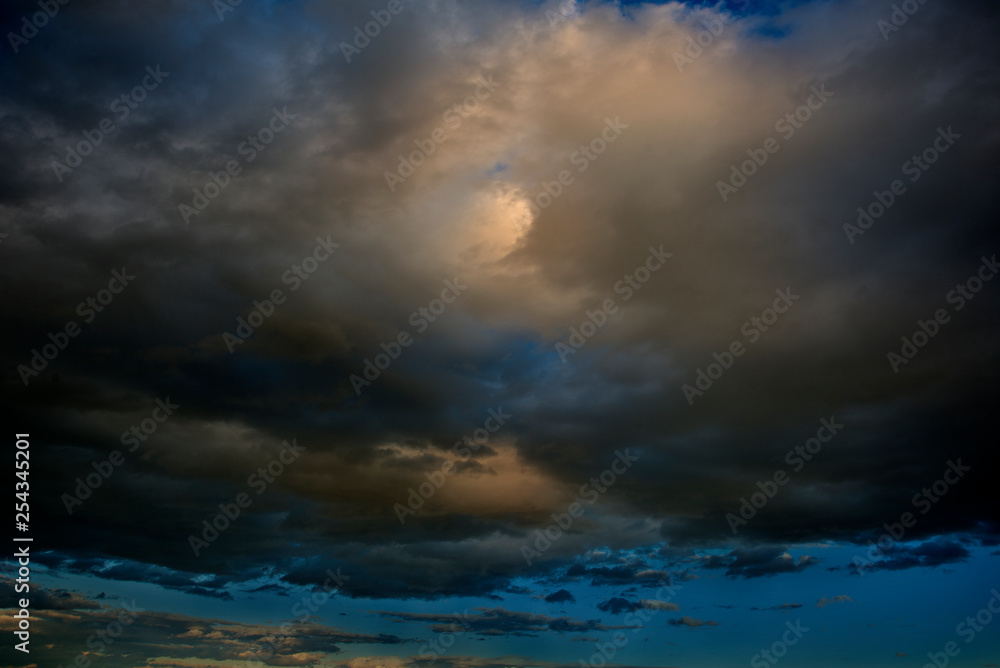 Dramatic Sky Background. Stormy Clouds in Dark Sky. Moody Cloudscape. Dramatic Sky Background. Stormy Clouds in Dark Sky. Moody Cloudscape.