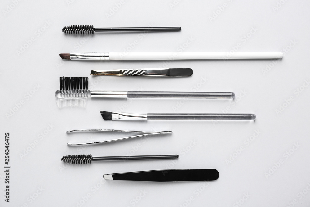 Set of tools for eyebrows correction on white background Set of tools for eyebrows correction on white background