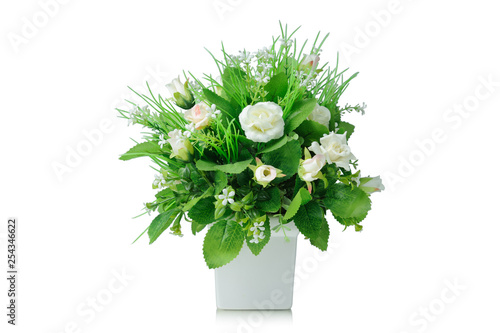 Foto Artificial flowers bouquet in vase isolated on white background