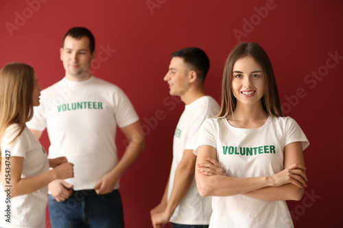 Young female volunteer and ...