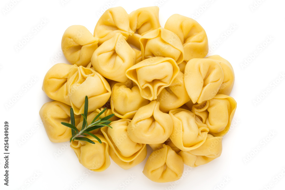 Raw homemade pasta,tortellini with herbs. Raw homemade pasta,tortellini with herbs.