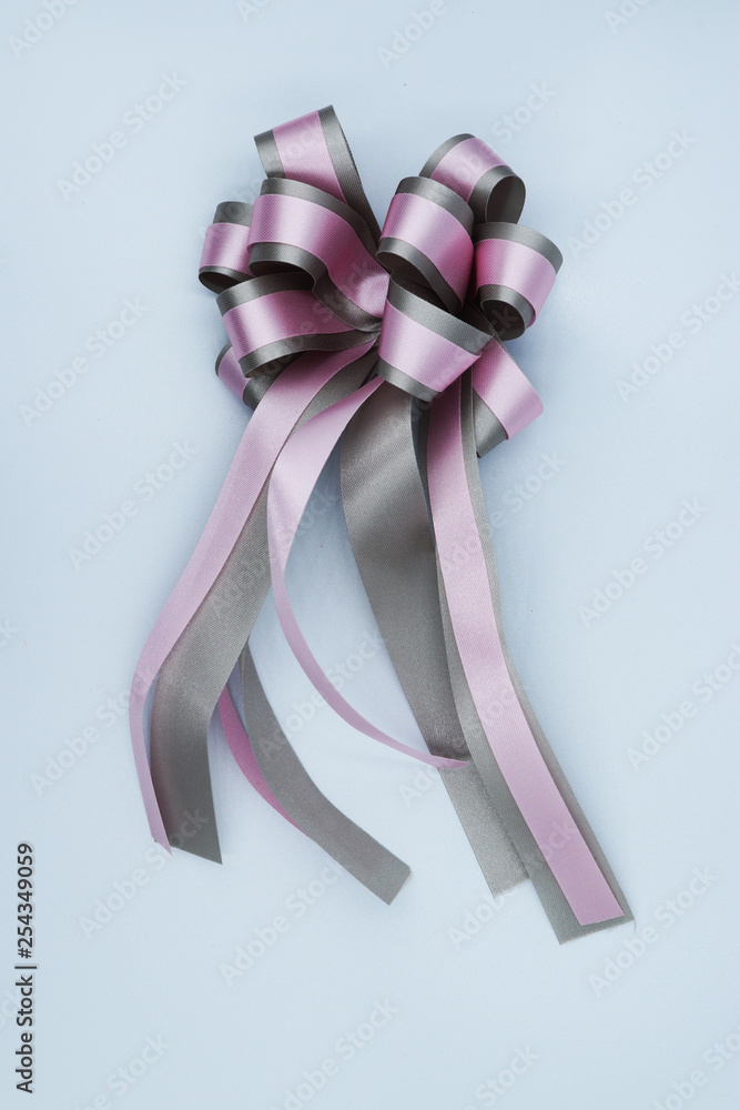 Purple ribbon bow isolated on white background. Purple ribbon bow isolated on white background.