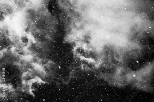 snowing sky with light clouds in black and white