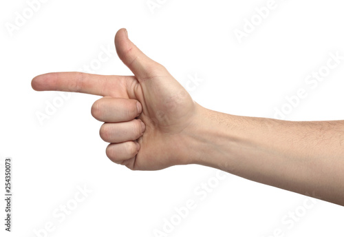 Male hand pointing at something on white background