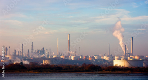 Early morning light over the oil refinery, Fawley, Hampshire, England, UK.
