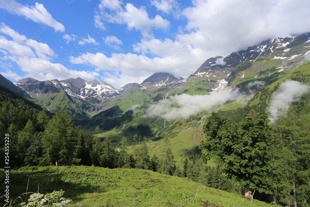 This photo was taken on observation road  Grossglockner.It is a beautiful view on mountains and forest. Photo was taken in Austria.