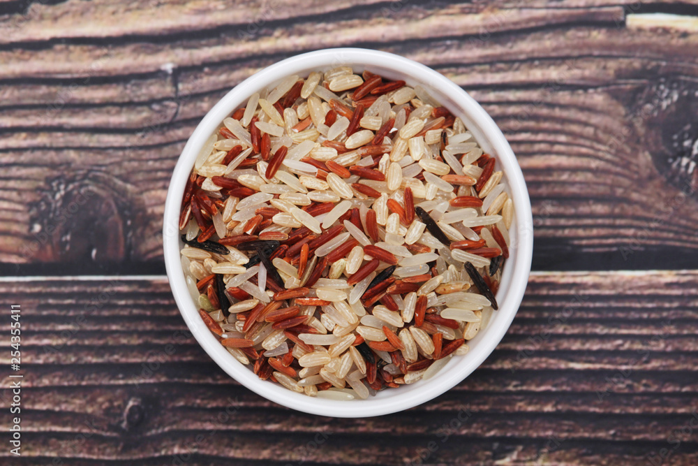 A mixture of brown, white, and red indica rice A mixture of brown, white, and red indica rice