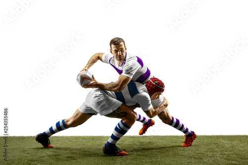 The silhouette of two caucasian rugby male players isolated on white background. Studio shot of fit men in motion or movement with ball. Jump and action concept. An incredible strain of all forces.