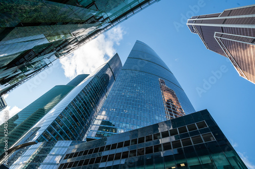 futuristic modern skyscrapers of glass and metal. Focus on buildings.