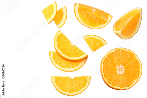 orange with slices isolated on white background. healthy food. top view