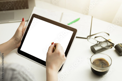Hipster woman hands holding digital tablet with empty blank screen for your text message, business person browsing internet or connecting to wireless via touchscreen pad