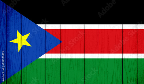 Flag of Southern Sudan on wooden background