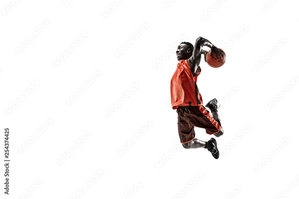 Full length portrait of a basketball player with a ball isolated on white studio background. advertising concept. Fit african american athlete jumping with ball. Motion, activity, movement concepts. Full length portrait of a basketball player with a ball isolated on white studio background. advertising concept. Fit african american athlete jumping with ball. Motion, activity, movement concepts.