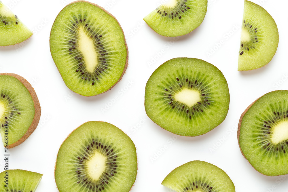 Fototapeta premium Kiwi fruit slices on white background.