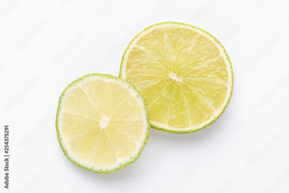 Composition with fresh ripe limes on light background, top view