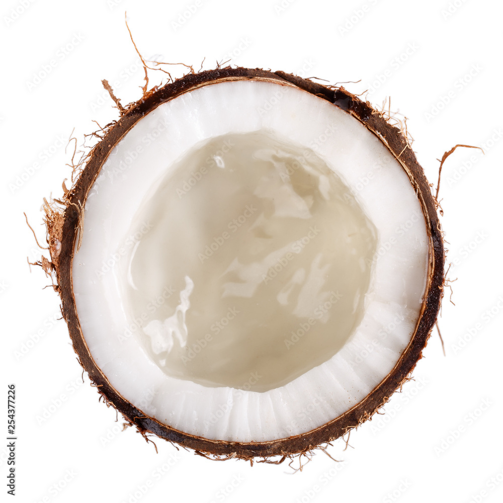 Half coconut with coconut water inside isolated on white. Top view. Half coconut with coconut water inside isolated on white. Top view.