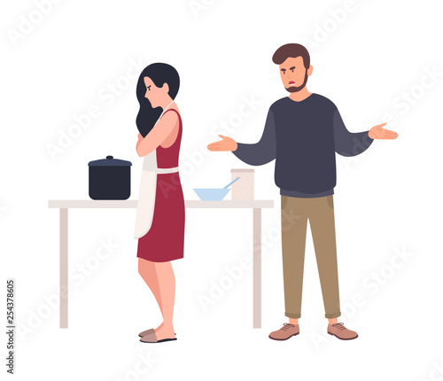 Husband shouting at wife while she is cooking in kitchen