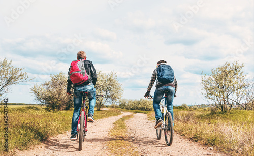 Two cyclists on the dirt road