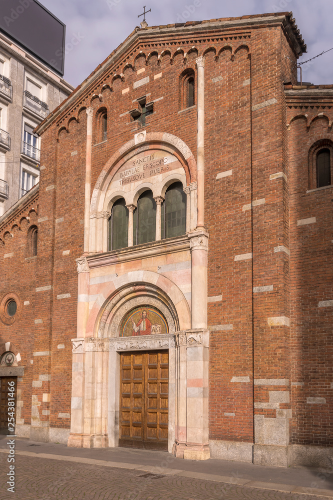 entrance portal of San Babila church, Milan, Italy