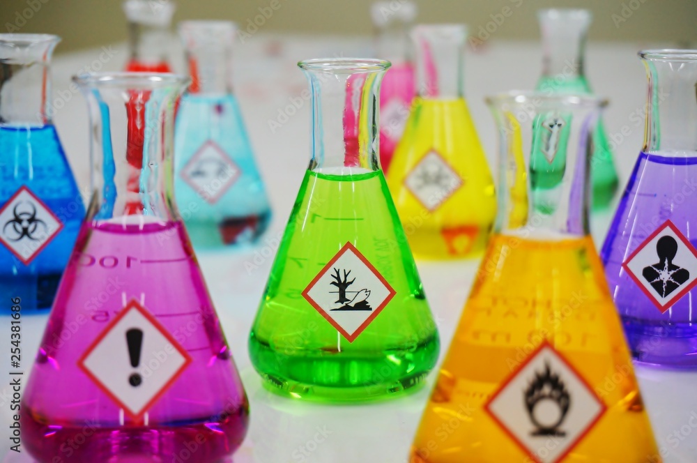 Many of Erlenmeyer flask with colorful solution and Variety type of