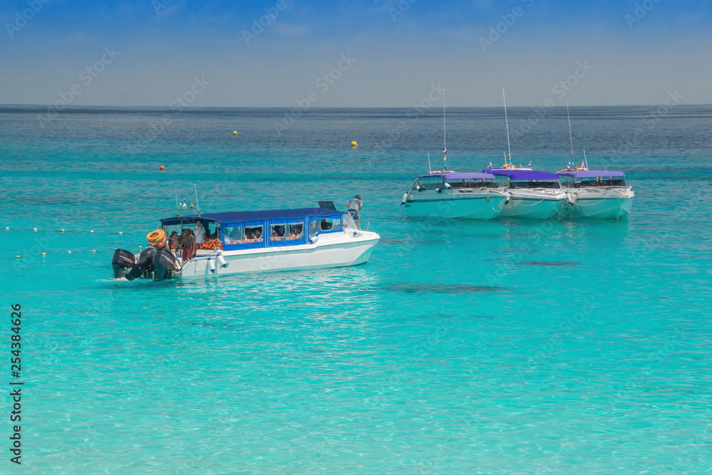 Boats for transporting tourists in the sea.Summer sea travel.Summer beach travel.