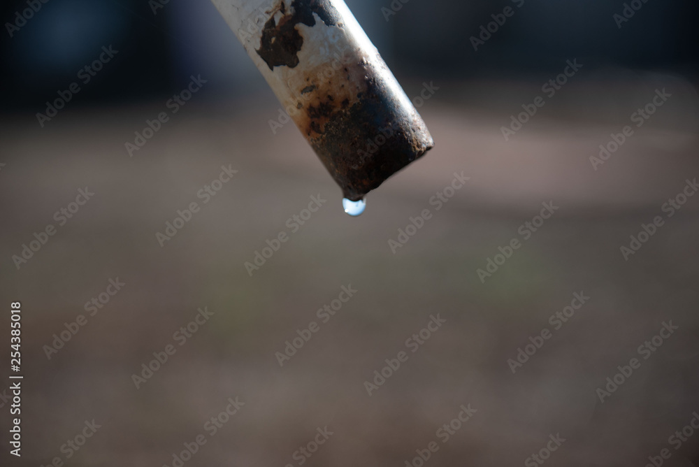 water drops from the tap water drops from the tap