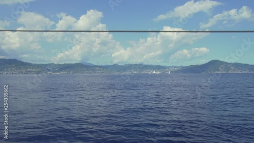 sailing along the coast in Italy photo