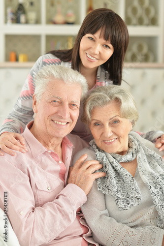 Portrait of happy family posing at home