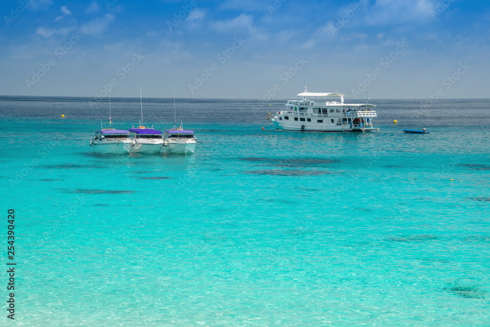 Boats for transporting tourists in the sea.Summer sea travel.Summer beach travel.