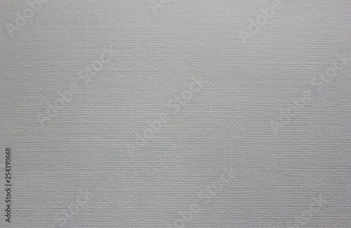 Paper texture background of light craft note page material design. Pale grey white pattern of paper or fabric canvas. Close up top view of greyish seamless surface backdrop with empty copy space