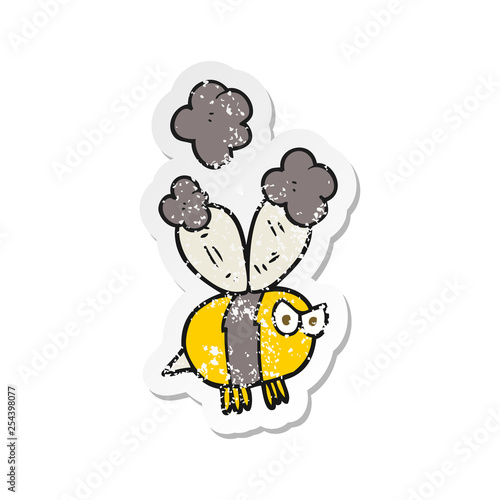 Fototapeta Naklejka Na Ścianę i Meble -  retro distressed sticker of a cartoon angry bee