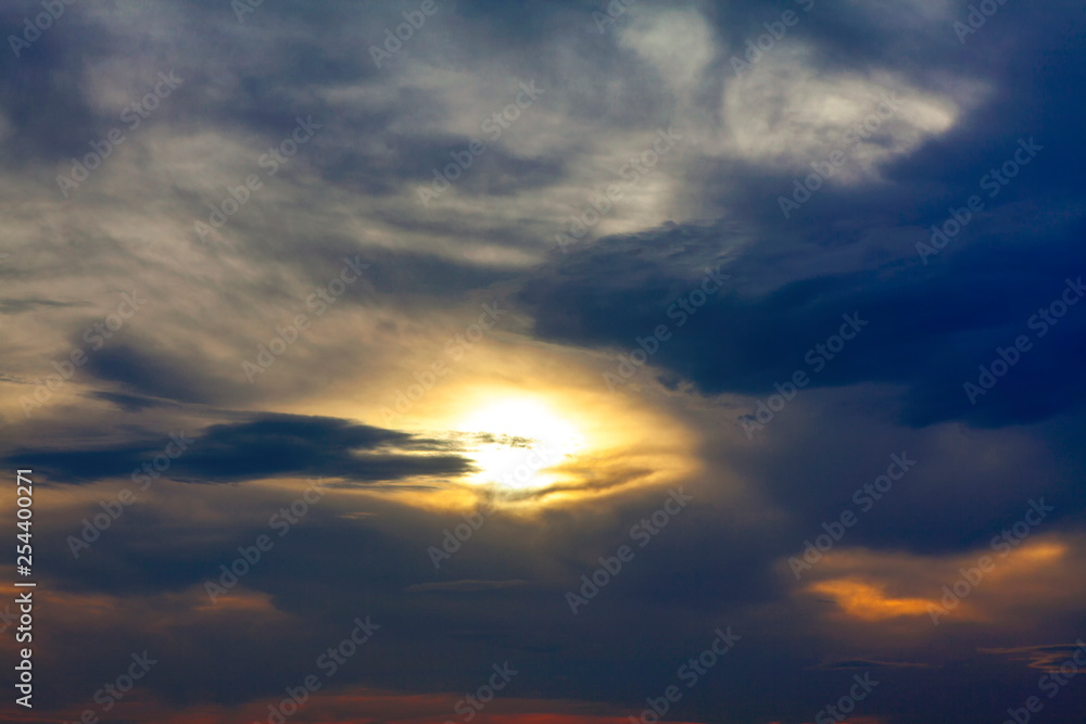 sun in the clouds before storm 