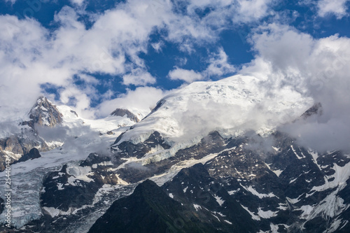 View of Mont Blanc massif and glacier in June. French Alps.