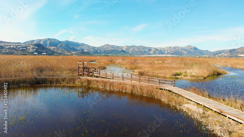 Aerial view of a bird observatory in the wetlands nature park La Marjal in Pego and Oliva, Spain.