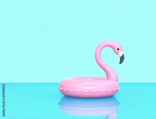 Inflatable flamingo on blue reflective surface