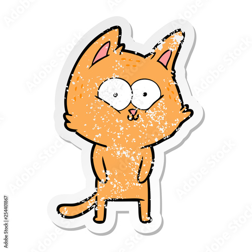 distressed sticker of a cartoon cat