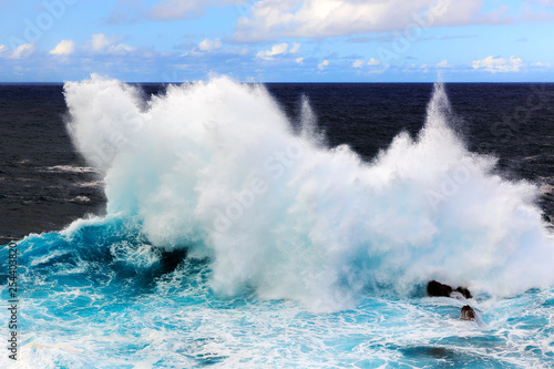 Beautiful seascape view of the big waves crashing at the shore at Porto Moniz, on the north coast of Madeira island
