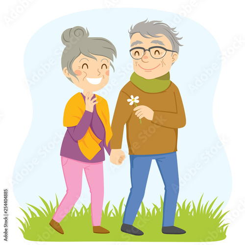Older couple having a romantic walk outside
