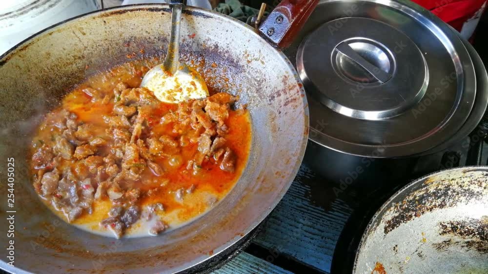 Thailand food ( Spicy Beef curry ) Stir fried Beef or pork with Curry spicy delicious in pan . Most popular menus and recommend in the country of Thailand.